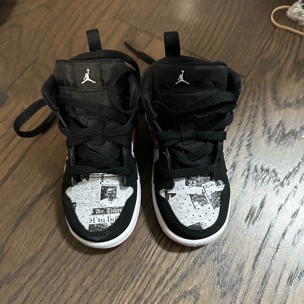 Jordon’s Kids Black and White Sneakers